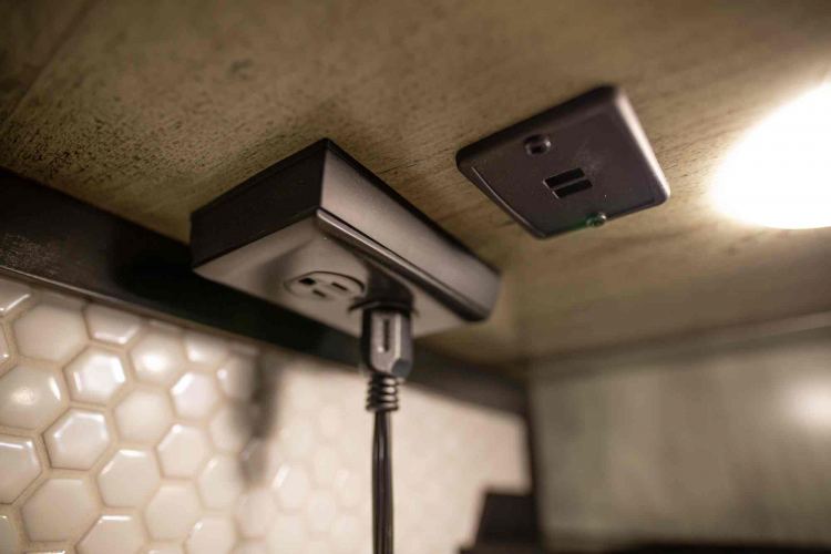 1492 Coachworks Toy Hauler 120V and USB Outlets Under All Overhead Cabinets