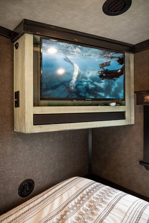 1492 Coachworks Toy Hauler Master Bedroom Entertainment Center